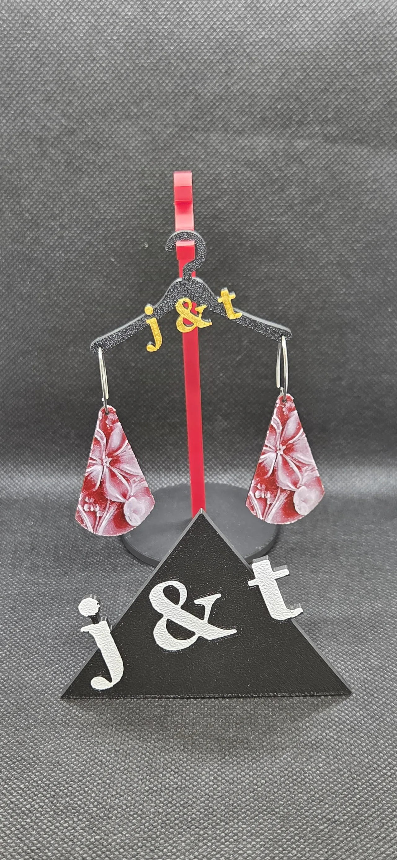 Floral hueforge teardrop earrings view 2