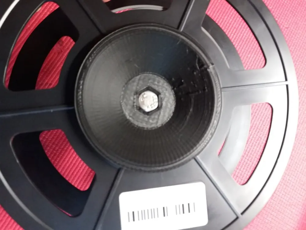 Filament spool winder for transfering wrong wrapped to another spool by ...