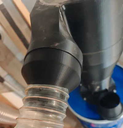 Vacuum hose and dust cyclone adapter