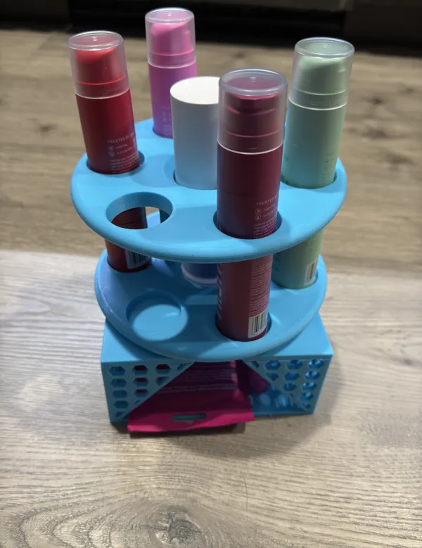 Carrousel rotatif pour tubes de dentifrice