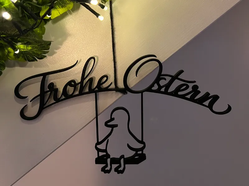Frohe Ostern schaukelnde Ente
