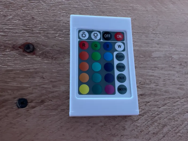 SUPPORTO A PARETE TELCOMANDO LED 