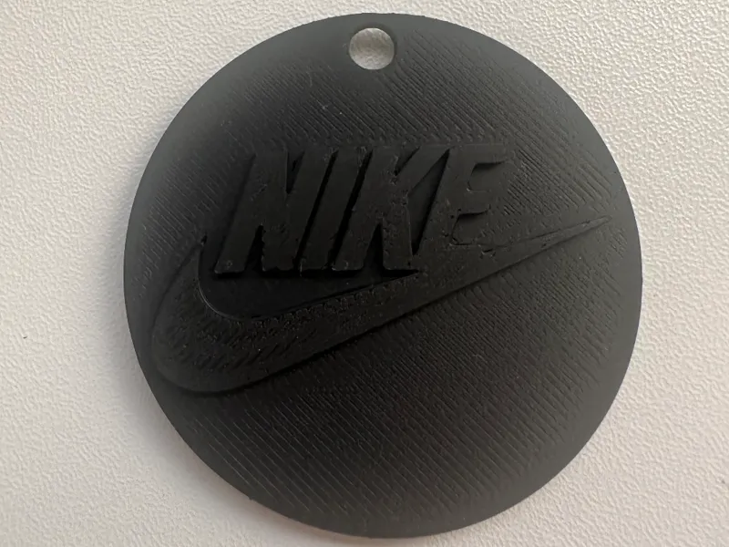 Nike logo keychain