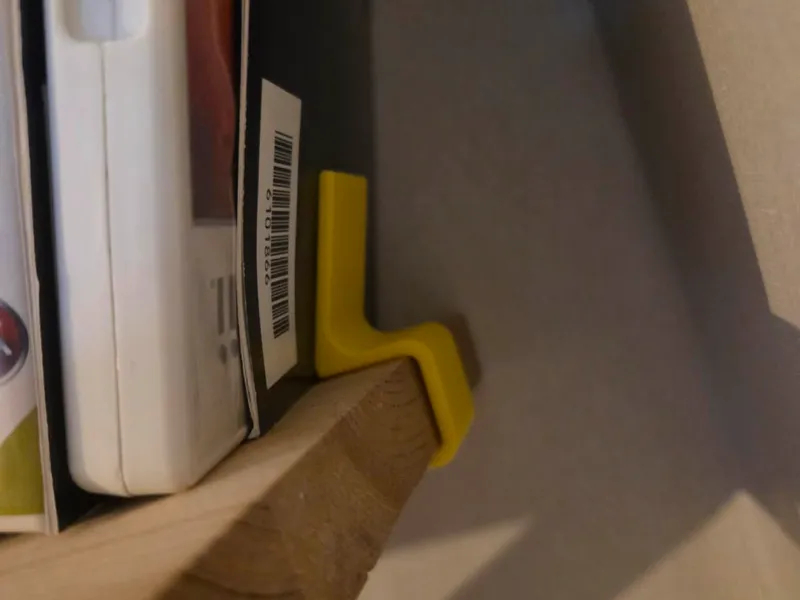 Book/game shelf rest
