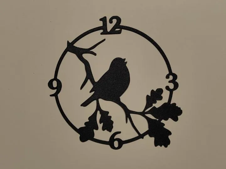 Horloge murale motif oiseau