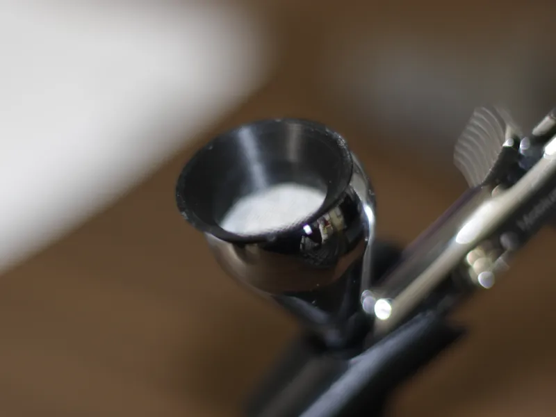 Airbrush cup paint strainer