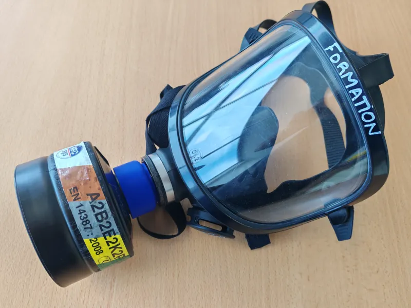 Bague intercalaire pour masque à gaz de formation