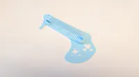 Grooming Tool with Comb