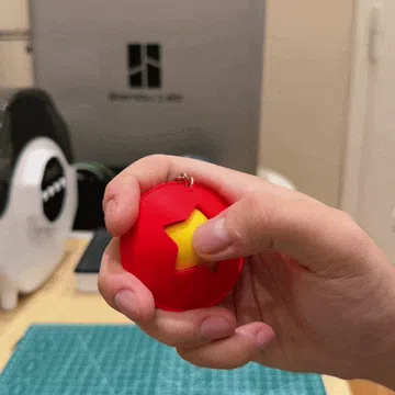 Objeto manipulable: Non La Clicker Toy — vista de referencia 3