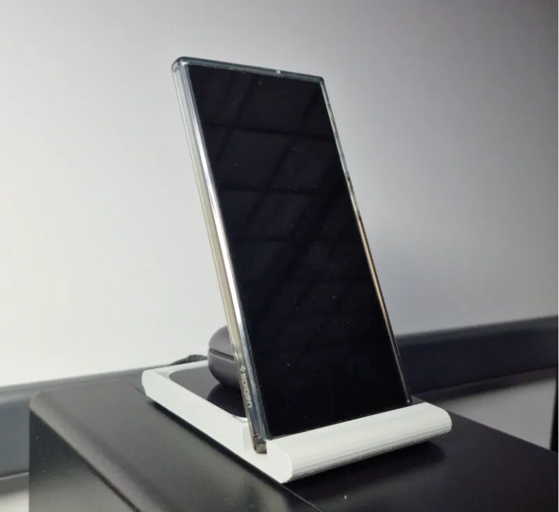 Phone stand with place for wireless charger