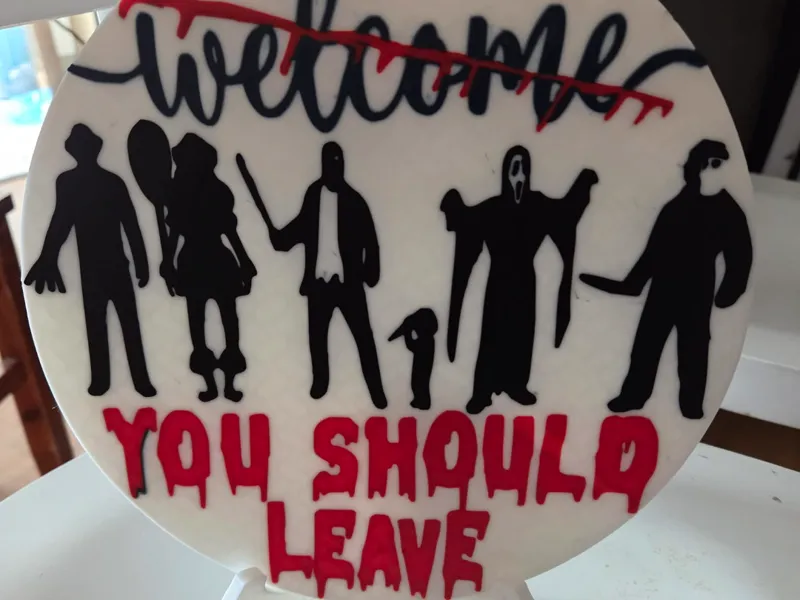 creepy welcome sign 