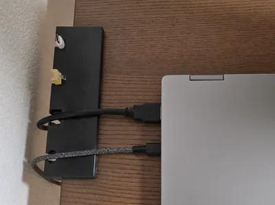 Cable holder for notebook