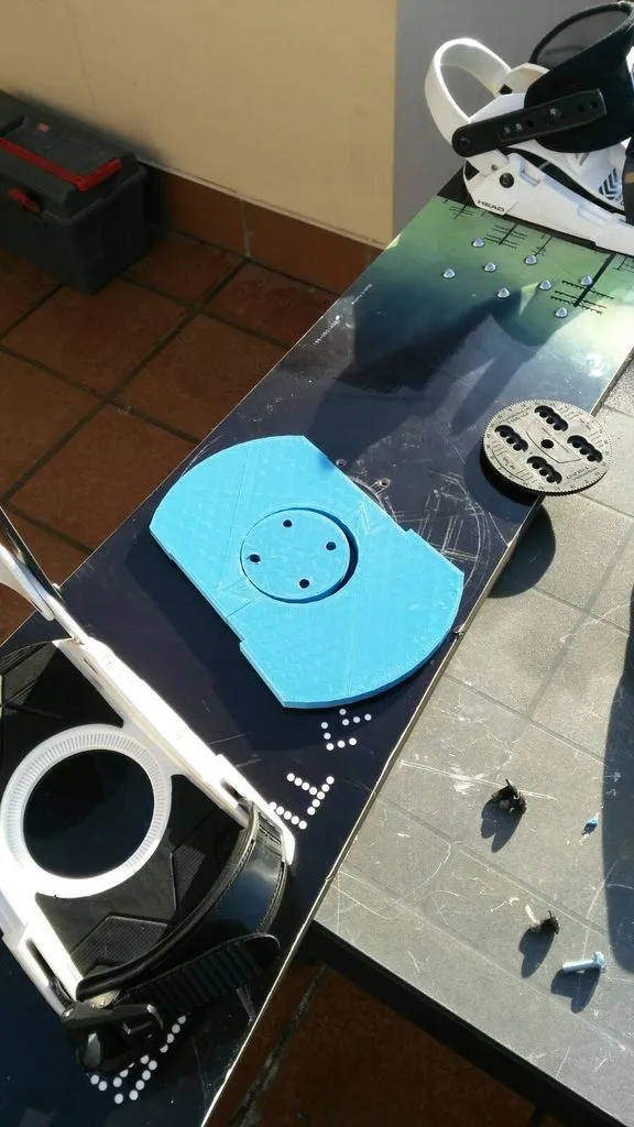 Cale de fixation pour planche de snowboard