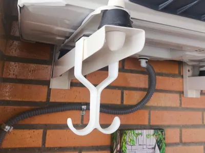 Double hook for air conditioner brackets