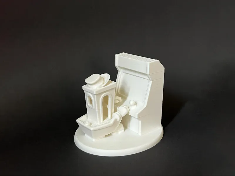 Benchy playing with an Arcade Machine