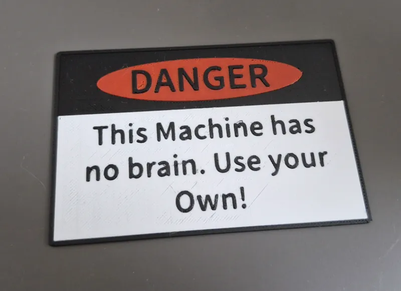 Danger Sign: This machine has no brain.