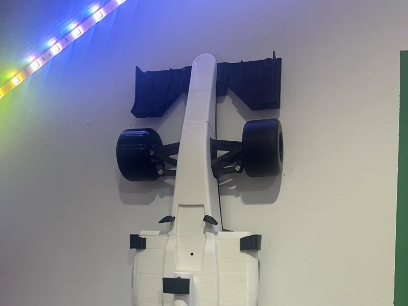 Simple and small Formula car wall holder