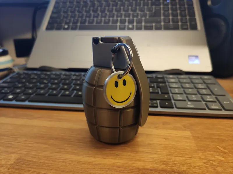 Bad company grenade with spring loaded lever