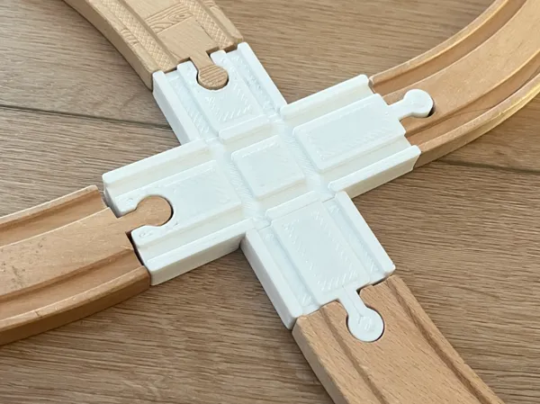 Croisement pour circuit de train en bois