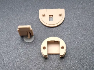 Guide coulissant pour porte de meuble