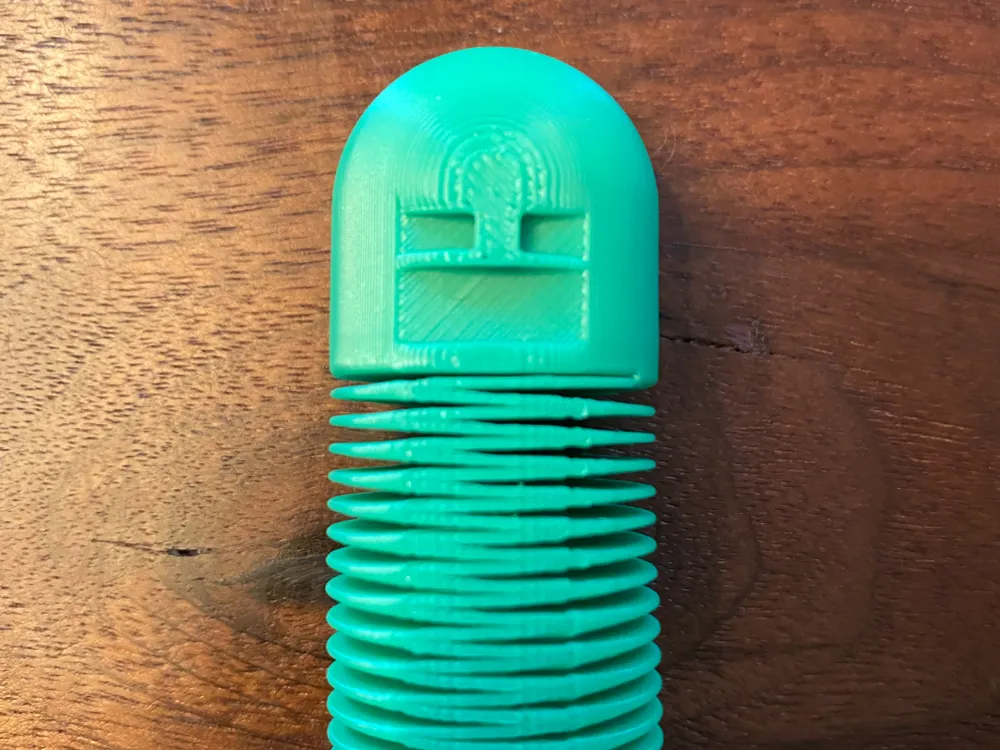 Objeto manipulable: Pickle fidget super satisfying -QUIET. Referencia del modelo original.