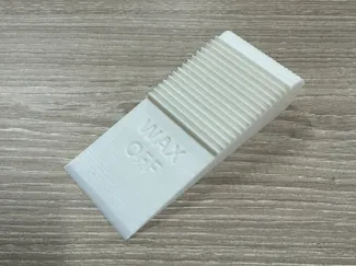 Furniture wax scraper