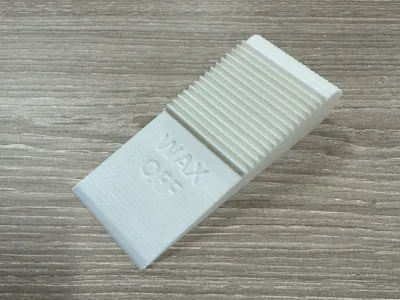 Furniture wax scraper