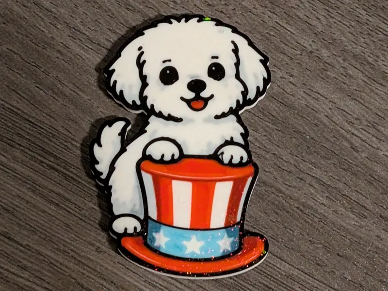 Maltese with an Uncle Sam hat.