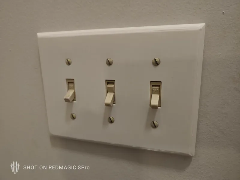 Triple light switch trim plate