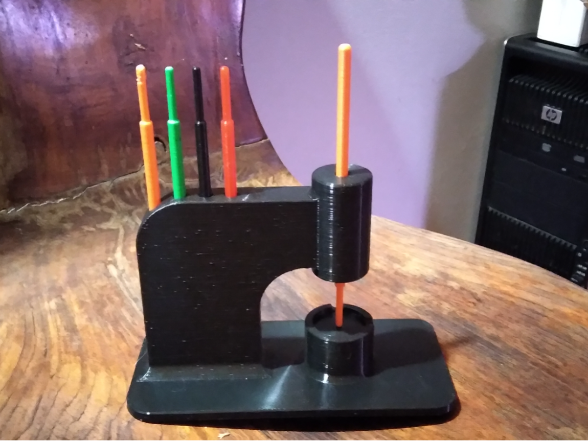 Watch hand press.