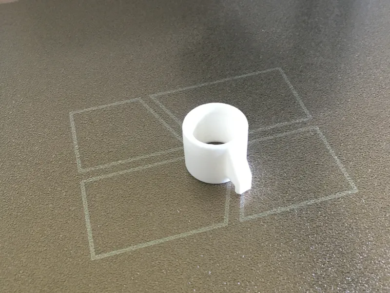 Rubber band shooter finger attachment