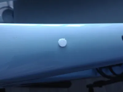 Frame screw plug