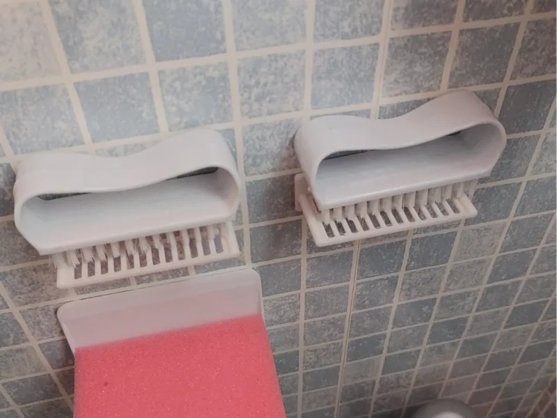 Nail brush tray.