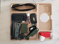 Phone on the right side of the tray