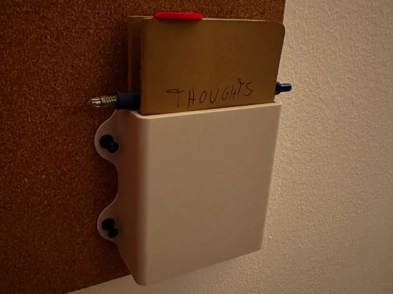 Notebook holder for cork memo board