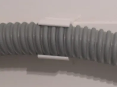 Parametric cpap tube holder for bed headboards