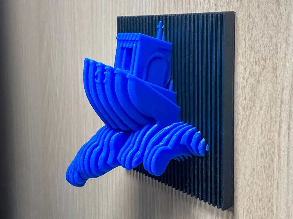 3DBenchy on wave - Sliced Art - Free 3D Print Model - MakerWorld