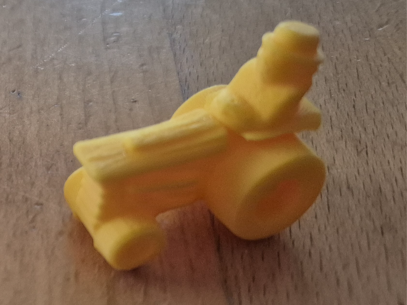 Kleine Traktorspielfigur