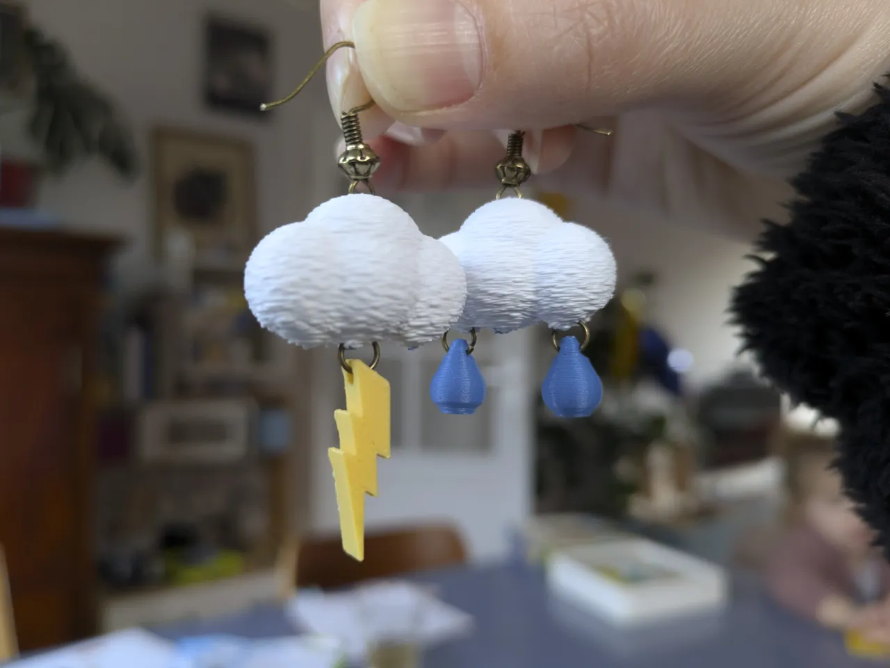 Cloud earrings with lightning bolt and raindrops view 3