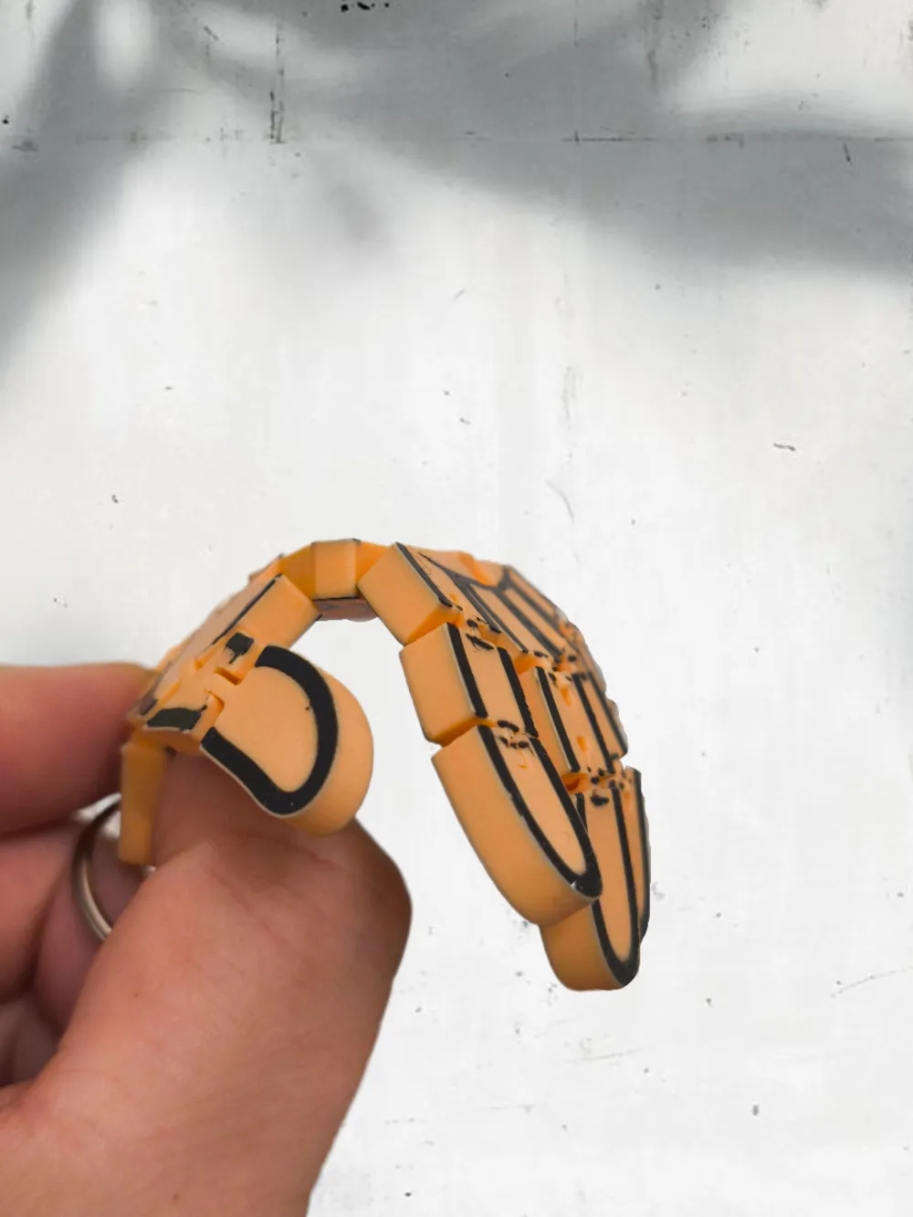 Flexible Hand Keychain. - Free 3D Print Model - MakerWorld