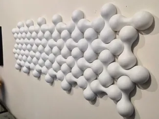 Modular organic composition in relief