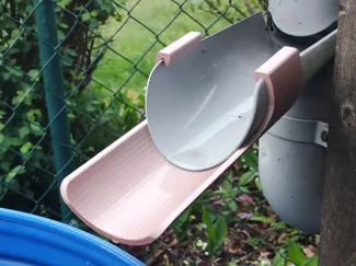 Extension for downpipe flap