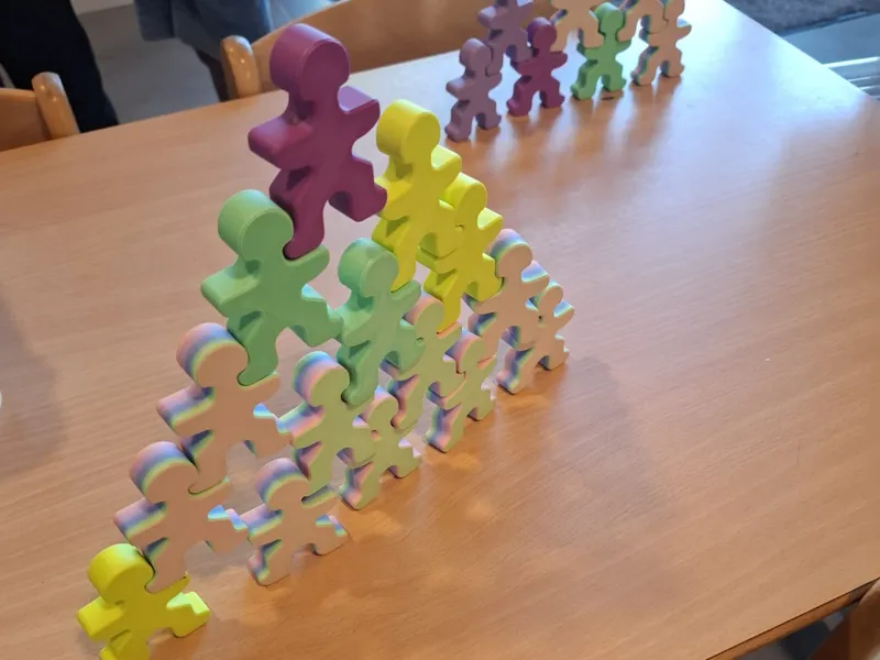Flocmen stapelfiguren sterke mannen balanceren