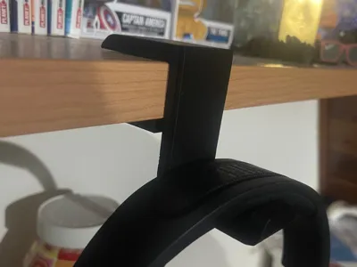 spring-loaded headphone holder