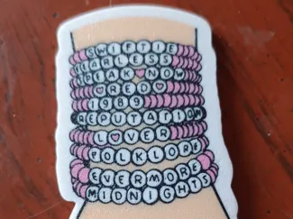 Topper Taylor Swift Brazo