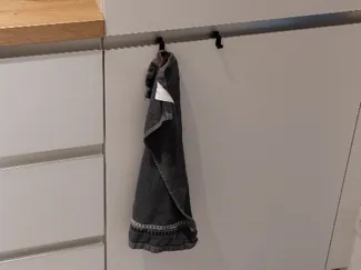 Hook for kitchen drawers with recessed grip