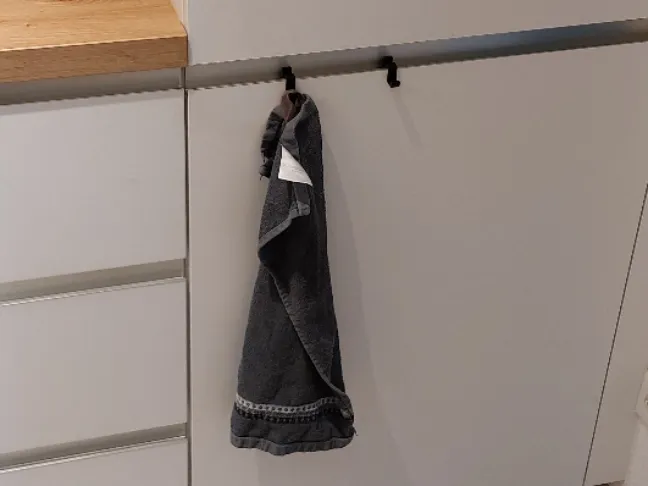 Hook for kitchen drawers with recessed grip