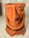 230mm tall with drainage hole