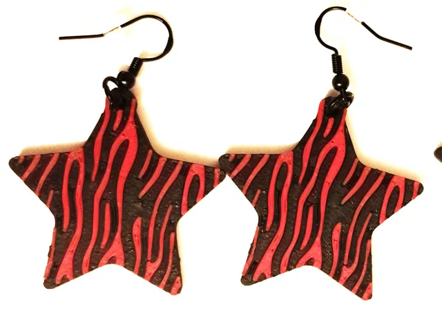 PENDIENTES ESTRELLA ANIMAL PRINT