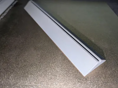 Base for modular coin stand with wider rail